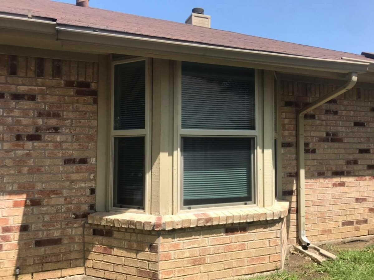 New windows installed on the front facade of a residential home