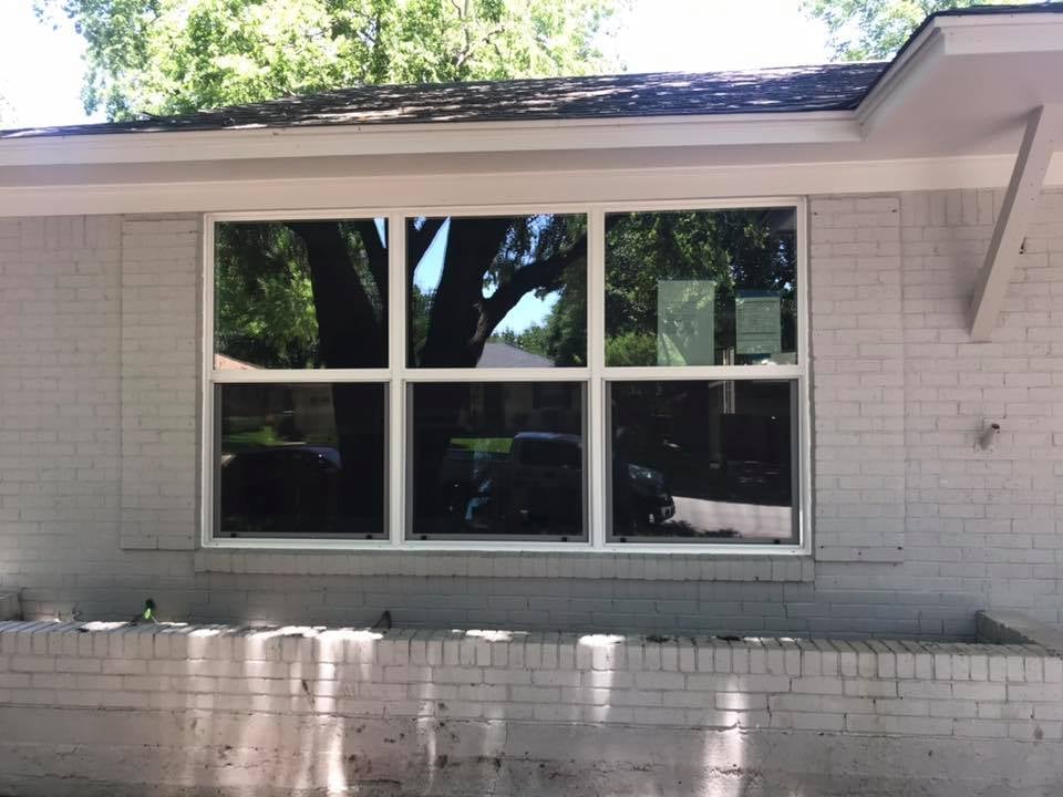 Replacement windows installed on a two-story residential home