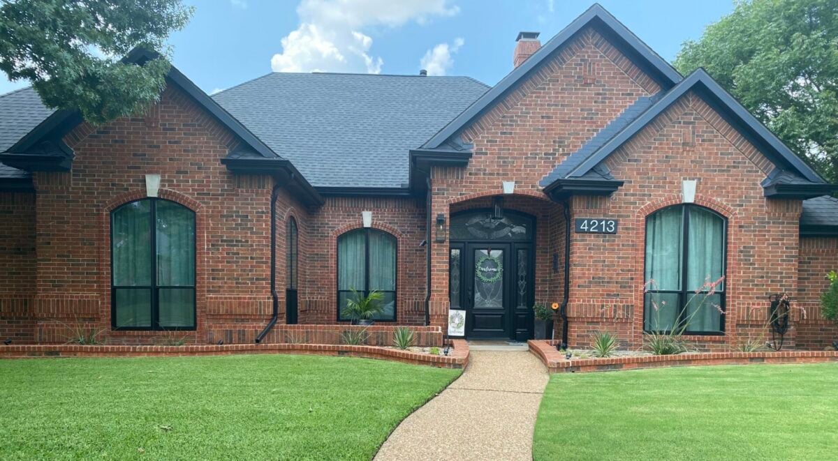 Residential window installation on a house exterior