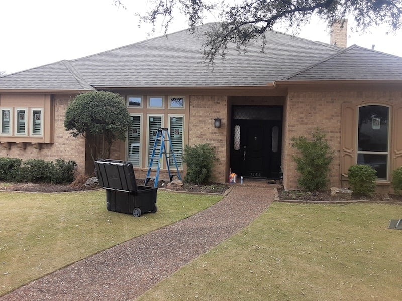 New vinyl windows installed on a home exterior